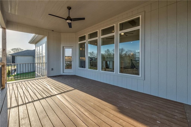 wooden deck with ceiling fan