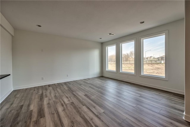 spare room featuring light wood-type flooring