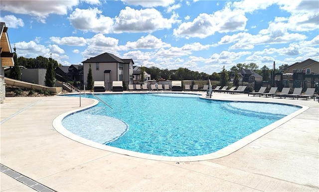 view of pool featuring a patio