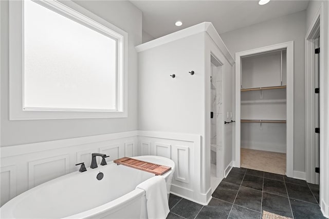 bathroom featuring a tub