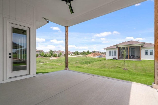 view of patio / terrace featuring a sunroom