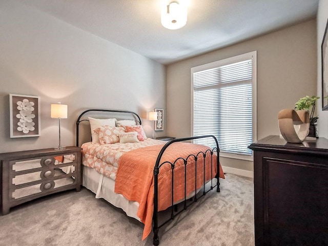 2908 NE 102nd St, Kansas City, MO 64155 - bedroom featuring light carpet