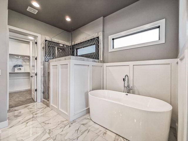 2908 NE 102nd St, Kansas City, MO 64155 - bathroom featuring shower with separate bathtub and tile flooring