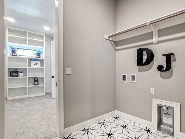 2908 NE 102nd St, Kansas City, MO 64155 - laundry area featuring light carpet and hookup for a washing machine