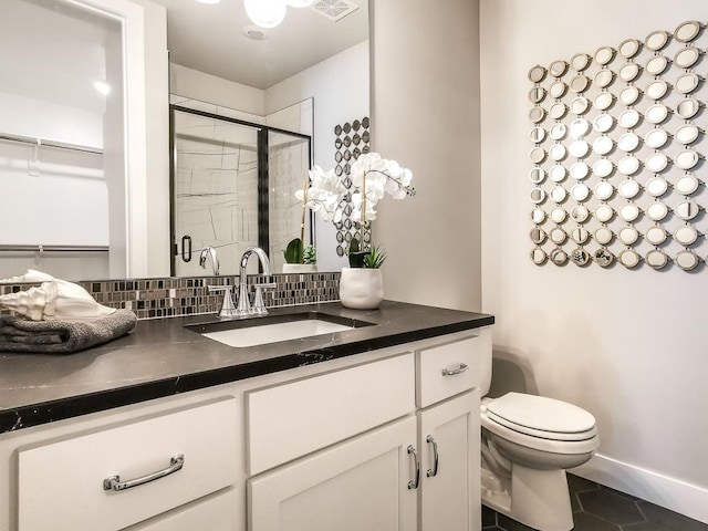2908 NE 102nd St, Kansas City, MO 64155 - bathroom featuring backsplash, toilet, tile floors, and vanity