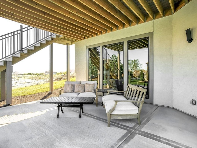 2908 NE 102nd St, Kansas City, MO 64155 - view of patio featuring an outdoor living space