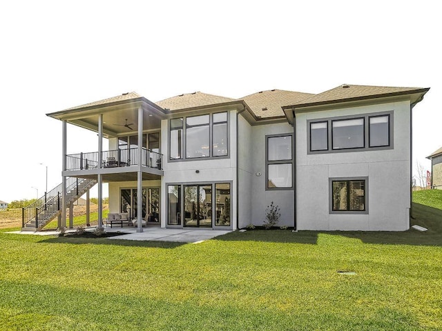 2908 NE 102nd St, Kansas City, MO 64155 - rear view of property featuring a lawn, ceiling fan, and a patio