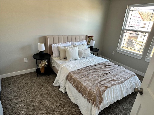 bedroom with dark carpet