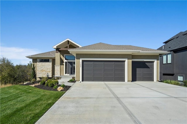 11606 S Zarda Dr, Olathe, KS 66061 - prairie-style home featuring a front lawn, stucco siding, driveway, stone siding, and an attached garage