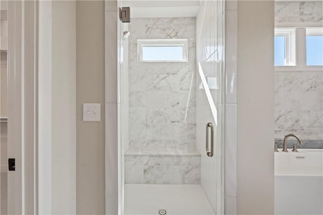 11606 S Zarda Dr, Olathe, KS 66061 - bathroom featuring a bathing tub and a stall shower