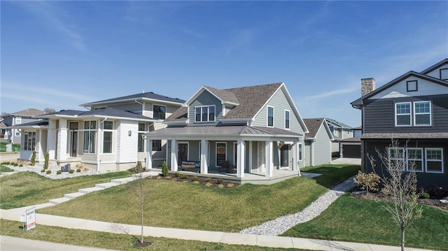 view of front of home with a front yard