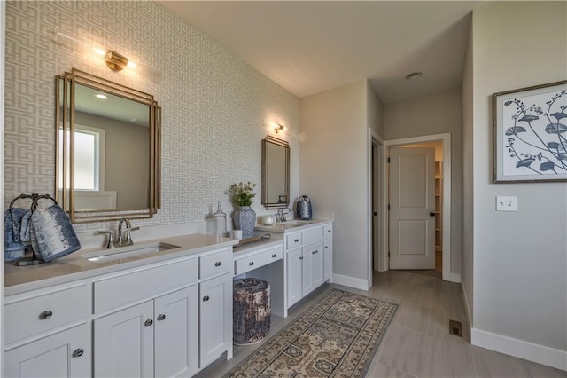 bathroom with double sink vanity and tile flooring