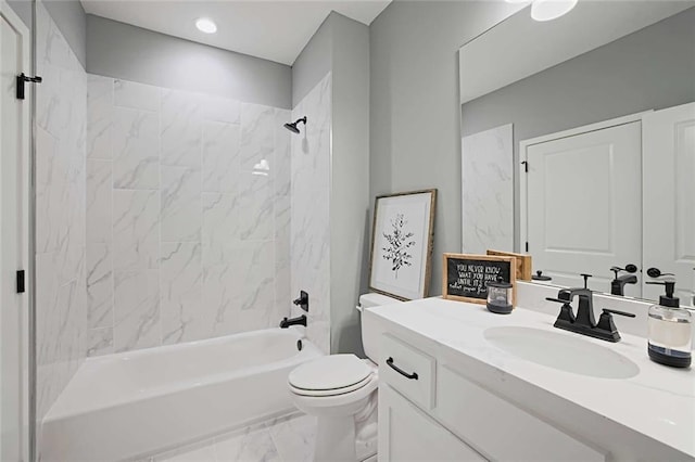 full bathroom featuring tile flooring, vanity with extensive cabinet space, toilet, and tiled shower / bath combo