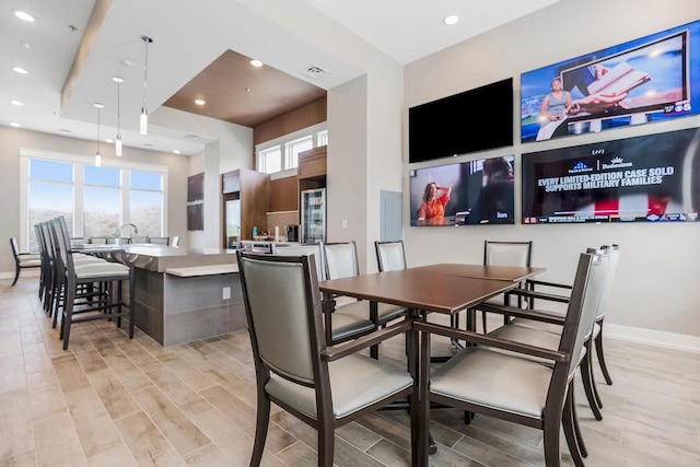 dining space featuring light hardwood / wood-style floors