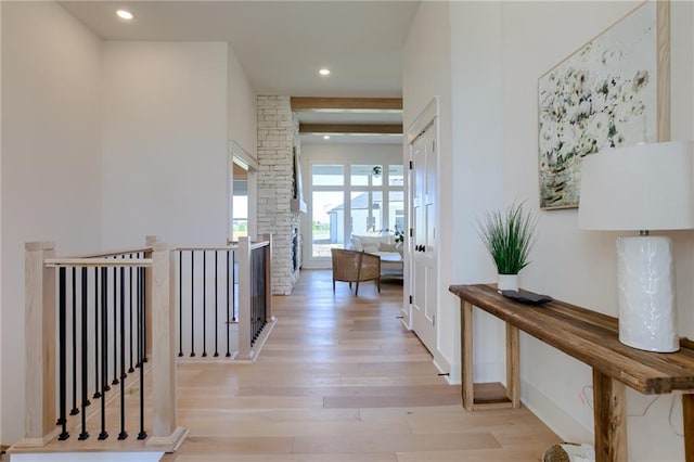 hallway with light wood-type flooring