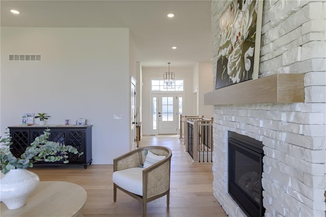 living room with light hardwood / wood-style flooring