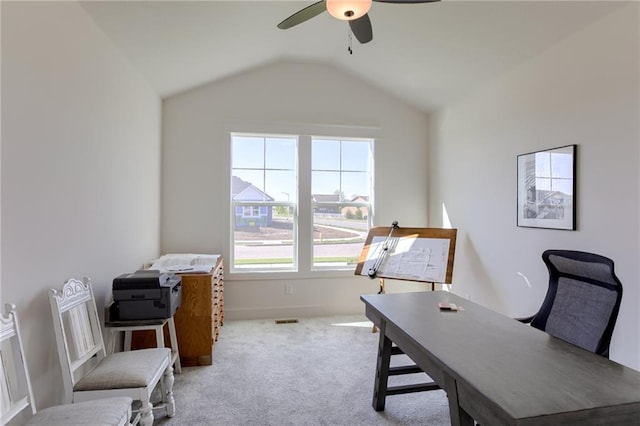 carpeted office featuring ceiling fan and lofted ceiling