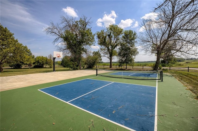 view of sport court featuring basketball hoop