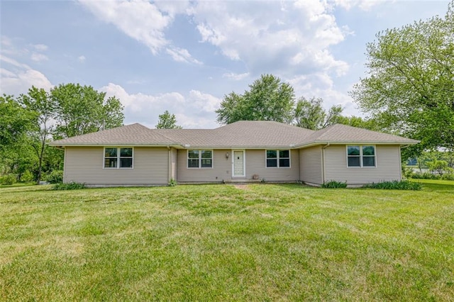 ranch-style house featuring a front lawn