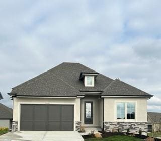 view of front of home featuring a garage