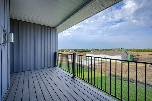 deck featuring a lawn