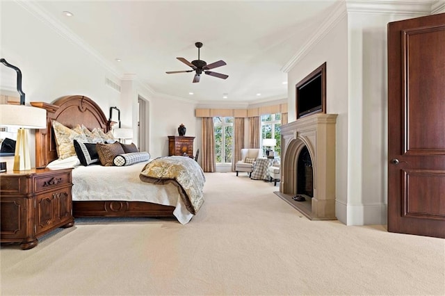 carpeted bedroom with ceiling fan and crown molding