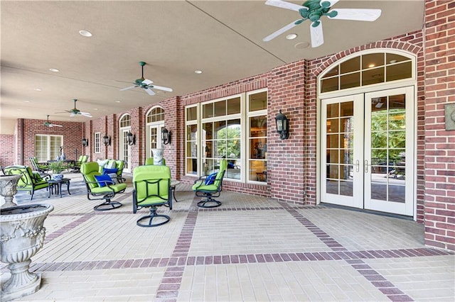 view of patio / terrace featuring ceiling fan and french doors