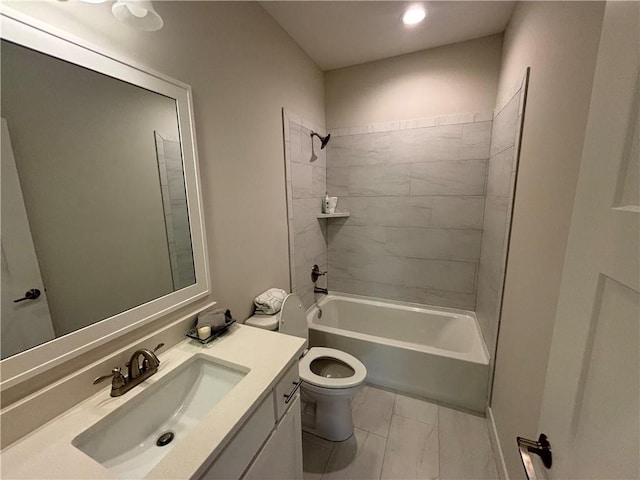 full bathroom with tiled shower / bath combo, vanity, tile floors, and toilet