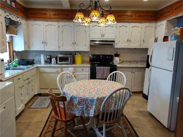 kitchen with white appliances, a notable chandelier, backsplash, and light tile floors