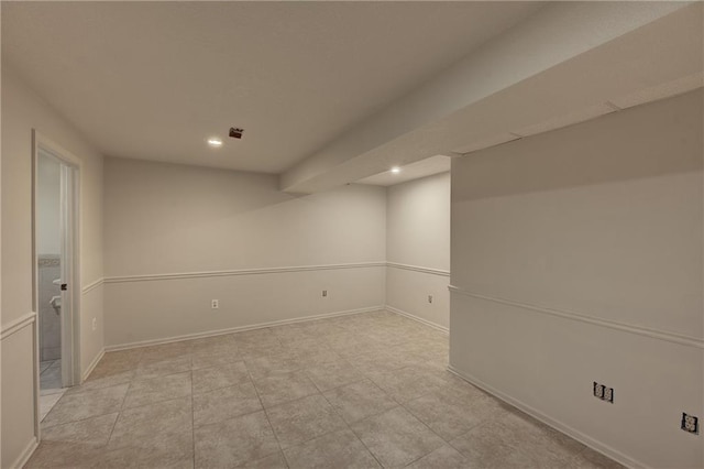 basement featuring light tile floors