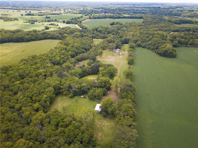 birds eye view of property featuring a rural view