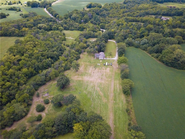 birds eye view of property featuring a rural view