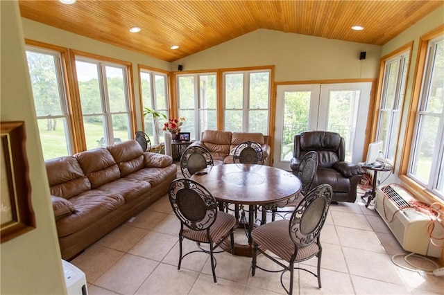 sunroom featuring wood ceiling, lofted ceiling, french doors, and a healthy amount of sunlight