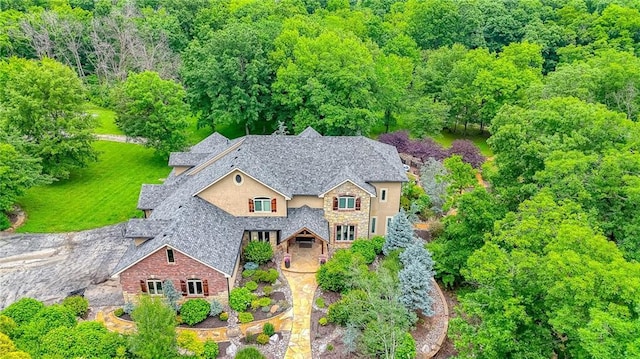 29800 E 65th St, Blue Springs, MO 64014 - view of subject property with a heavily wooded area