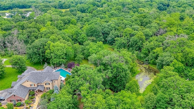 29800 E 65th St, Blue Springs, MO 64014 - aerial view of property's location featuring a heavily wooded area