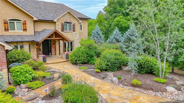 29800 E 65th St, Blue Springs, MO 64014 - view of front of house with stone siding and stucco siding