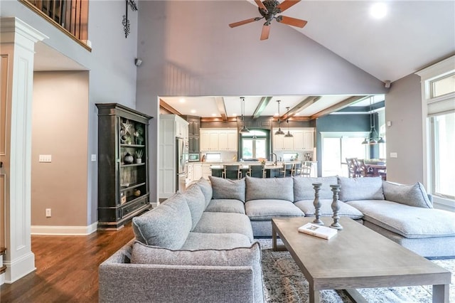 29800 E 65th St, Blue Springs, MO 64014 - living room featuring dark wood finished floors, a ceiling fan, a high ceiling, baseboards, and recessed lighting