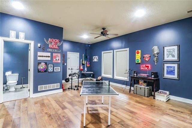 29800 E 65th St, Blue Springs, MO 64014 - playroom featuring a ceiling fan, wood finished floors, and baseboards