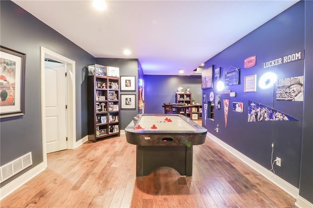 29800 E 65th St, Blue Springs, MO 64014 - playroom with wood finished floors, baseboards, and recessed lighting