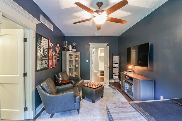 29800 E 65th St, Blue Springs, MO 64014 - living room featuring a ceiling fan and baseboards
