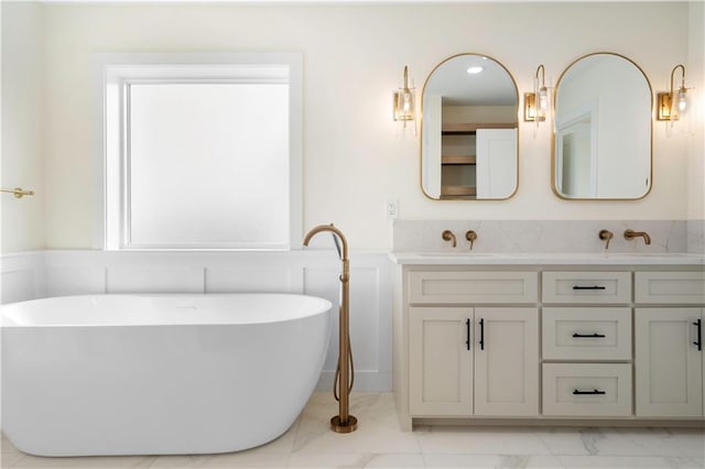 bathroom featuring a bathtub and vanity