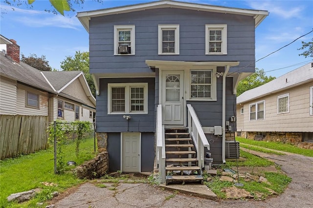 front facade with central AC unit