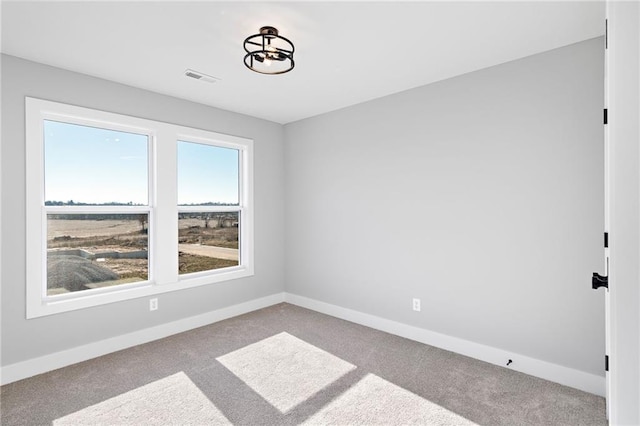 view of carpeted spare room