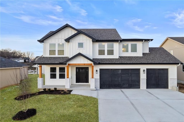 modern farmhouse style home with a garage, a front yard, and covered porch