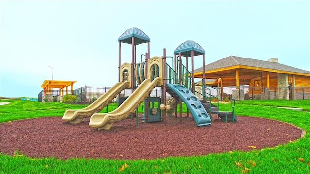 view of playground featuring a lawn