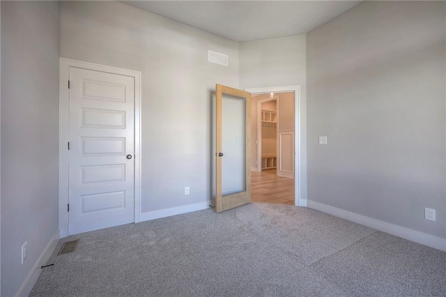 view of carpeted spare room