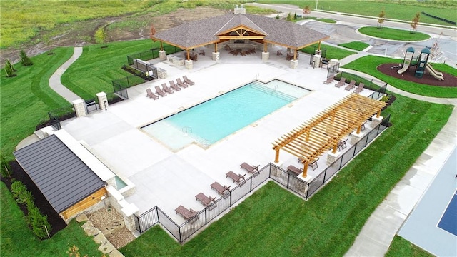 view of swimming pool with a playground, a gazebo, and a patio area