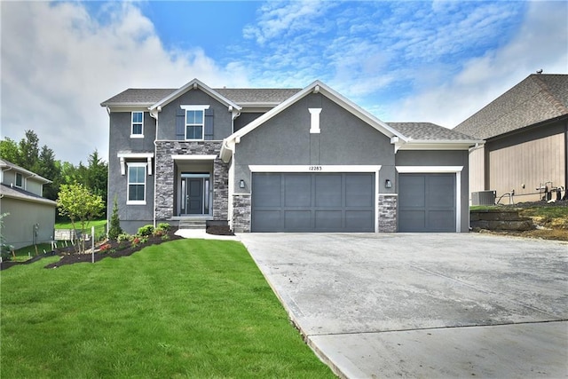 craftsman inspired home featuring a garage and a front yard