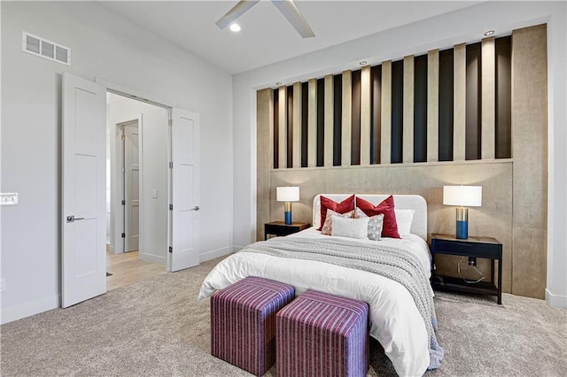 carpeted bedroom with ceiling fan