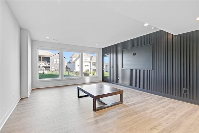 unfurnished living room with light wood-type flooring